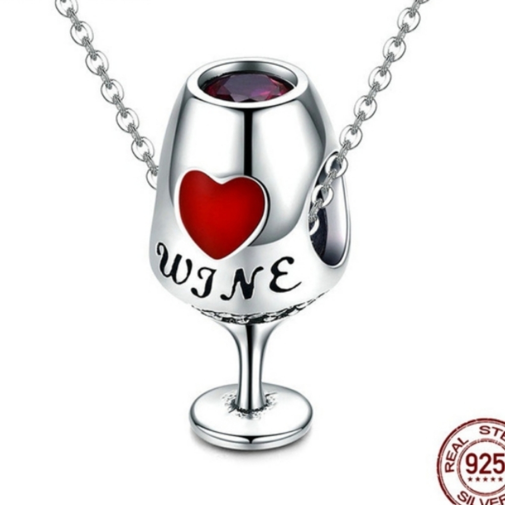 Wine glass charm with red heart